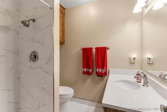 2612 W Quincy St, Broken Arrow, OK 74012 - bathroom with vanity, toilet, and a marble finish shower