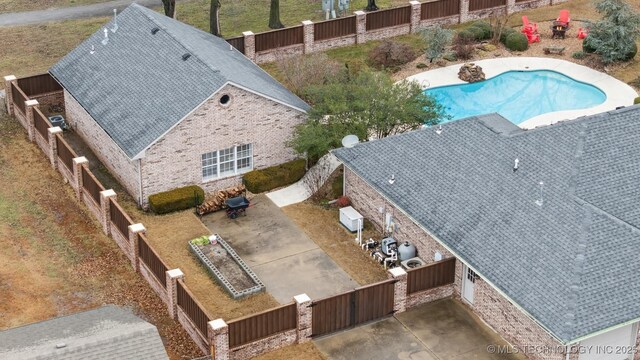 625 Grove Crest Rd, Pryor, OK 74361 - aerial view of property and surrounding area featuring a pool area