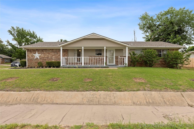 502 E D St, Jenks, OK 74037 - ranch-style house featuring covered porch, a front lawn, and brick siding