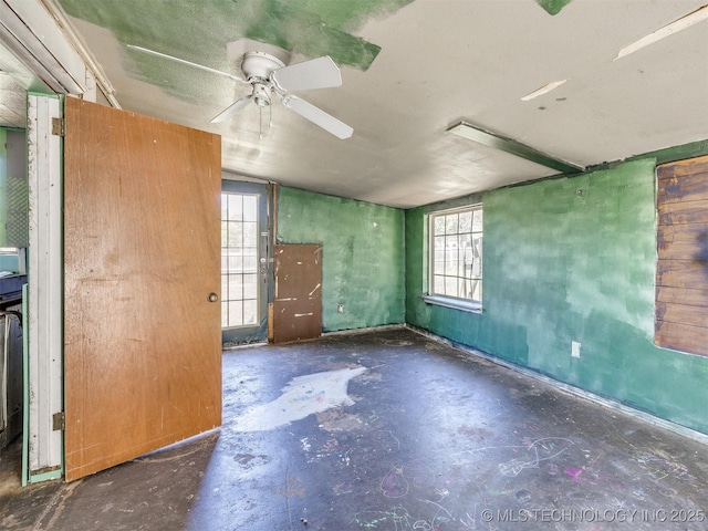 31229 E 682nd Rd, Wagoner, OK 74467 - spare room featuring concrete flooring and ceiling fan