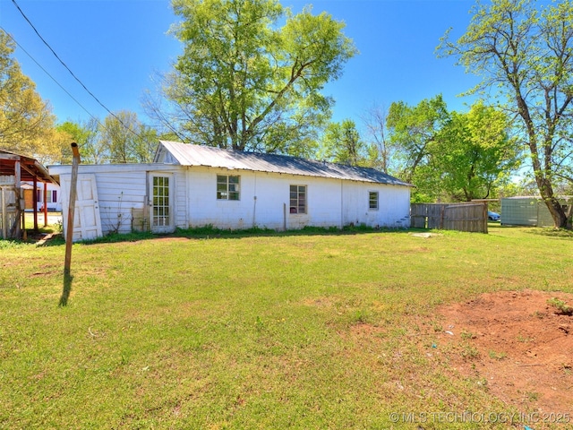 31229 E 682nd Rd, Wagoner, OK 74467 - rear view of property with metal roof