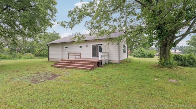 19826 S Covey Ct, Claremore, OK 74019 - back of property with a wooden deck and a yard