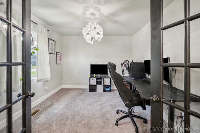 2806 S 136th Ave, Tulsa, OK 74134 - carpeted office featuring a chandelier, baseboards, and french doors