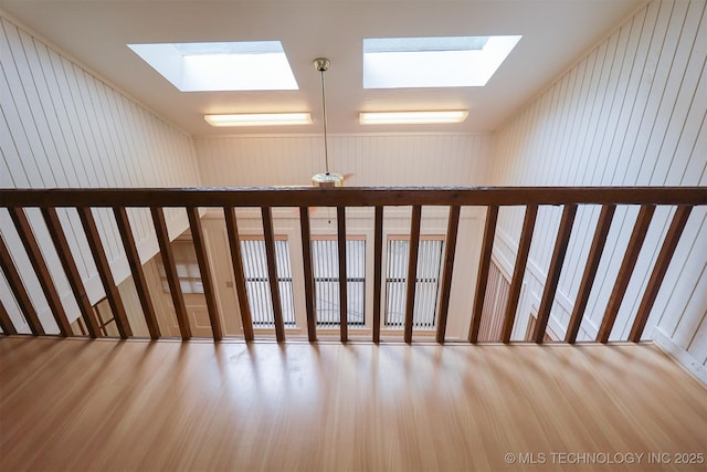9337 S Lakewood Ave, Tulsa, OK 74137 - staircase featuring a skylight and wood finished floors