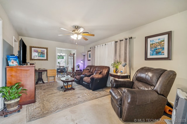 5614 S Newport Ave Unit 5614, Tulsa, OK 74105 - living area with carpet flooring and a ceiling fan