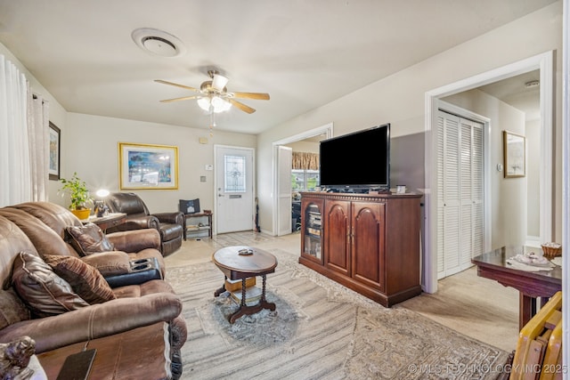 5614 S Newport Ave Unit 5614, Tulsa, OK 74105 - living room with ceiling fan and light colored carpet
