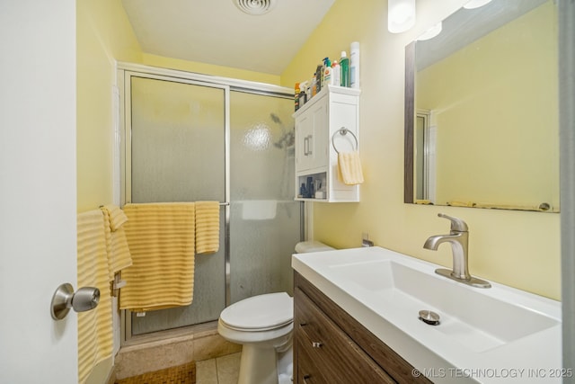 5614 S Newport Ave Unit 5614, Tulsa, OK 74105 - bathroom featuring vanity, toilet, a shower with shower door, and tile patterned floors