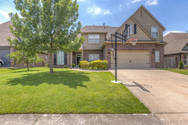 5006 S 164th E Ave, Tulsa, OK 74134 - view of front facade featuring brick siding, concrete driveway, and a front yard