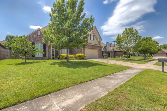 5006 S 164th E Ave, Tulsa, OK 74134 - view of front of house featuring brick siding, an attached garage, and driveway