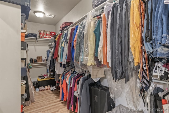 5006 S 164th E Ave, Tulsa, OK 74134 - spacious closet featuring wood finished floors