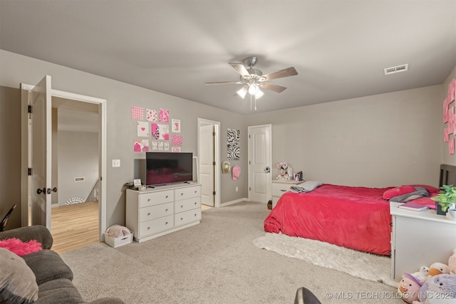 5006 S 164th E Ave, Tulsa, OK 74134 - bedroom featuring light colored carpet and ceiling fan