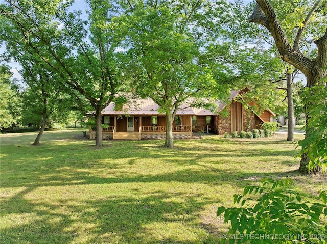 3419 State Highway 199, Dickson, OK 73401 - view of green lawn with a porch