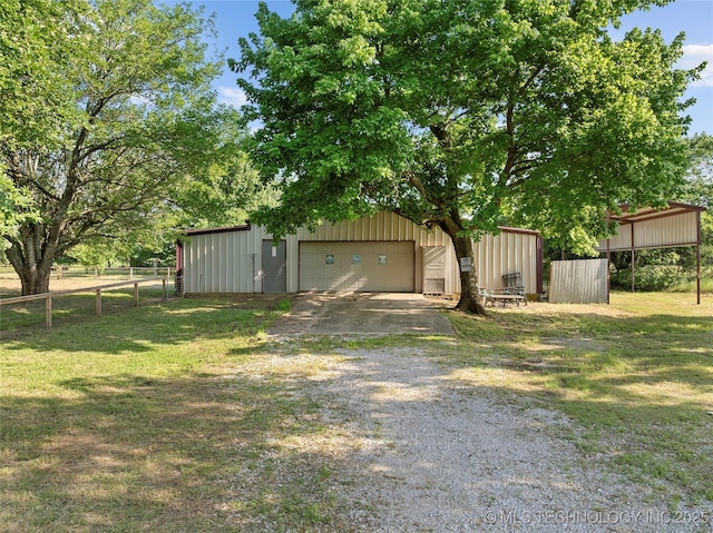 3419 State Highway 199, Dickson, OK 73401 - view of yard with a garage, an outdoor structure, an outbuilding, and gravel driveway