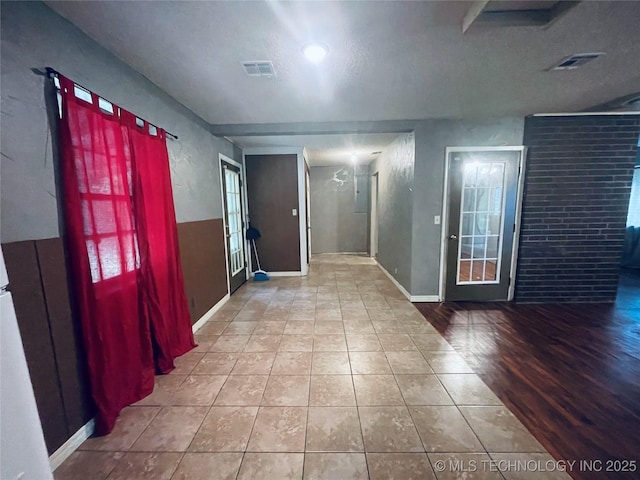 910 Race St, Boswell, OK 74727 - foyer with baseboards and tile patterned flooring