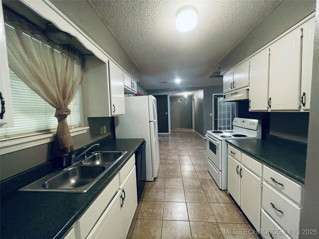910 Race St, Boswell, OK 74727 - kitchen with white electric range, a sink, black dishwasher, a textured ceiling, and dark countertops