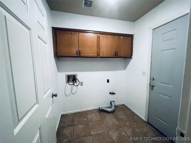 910 Race St, Boswell, OK 74727 - laundry area with cabinet space, electric dryer hookup, washer hookup, and baseboards
