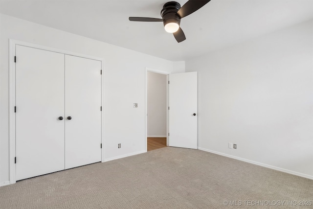 4204 W Freeport St, Broken Arrow, OK 74012 - unfurnished bedroom featuring carpet flooring, baseboards, a closet, and a ceiling fan