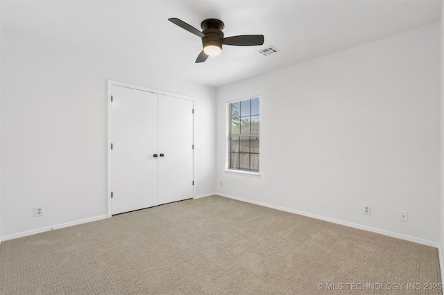 4204 W Freeport St, Broken Arrow, OK 74012 - unfurnished bedroom featuring carpet flooring, baseboards, a closet, and ceiling fan