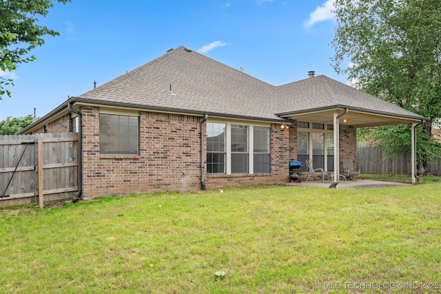 4204 W Freeport St, Broken Arrow, OK 74012 - rear view of house with brick siding, a patio, and roof with shingles