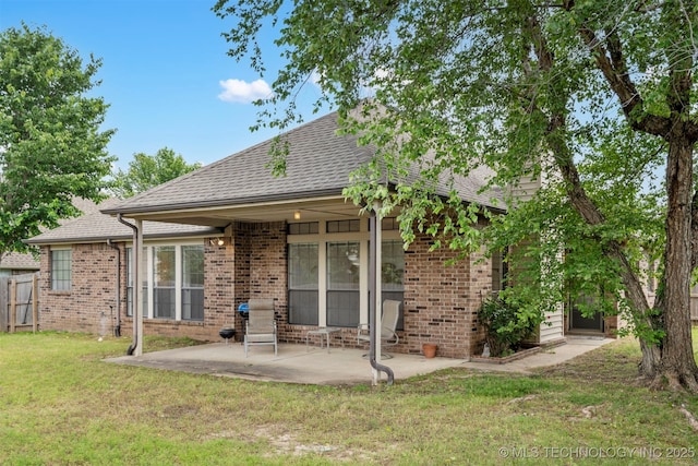 4204 W Freeport St, Broken Arrow, OK 74012 - back of house with roof with shingles, a patio, and brick siding