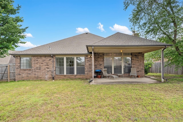 4204 W Freeport St, Broken Arrow, OK 74012 - back of property featuring brick siding, a patio, a chimney, and a shingled roof