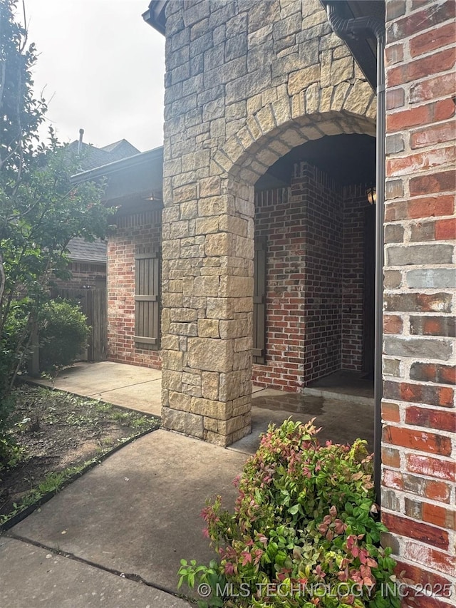 2508 E 140th Pl S, Jenks, OK 74008 - property entrance featuring brick siding