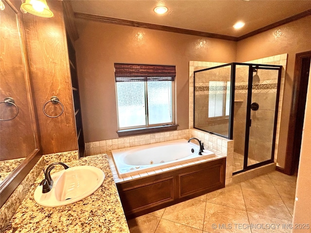 2508 E 140th Pl S, Jenks, OK 74008 - bathroom with crown molding, a jetted tub, a stall shower, vanity, and tile patterned flooring