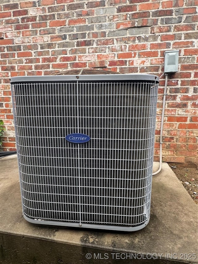 2508 E 140th Pl S, Jenks, OK 74008 - exterior view of cooling unit and brick siding