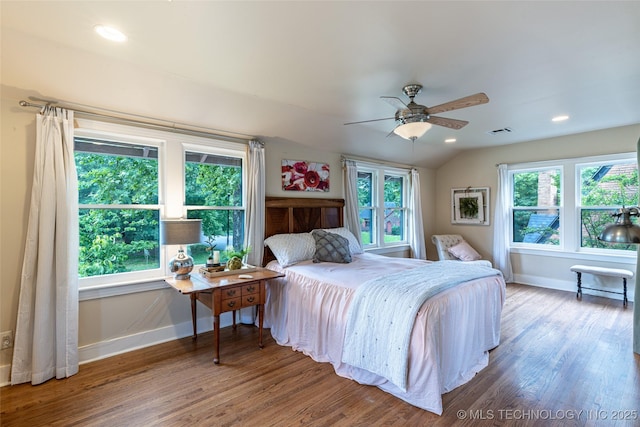 3160 S Owasso Ave, Tulsa, OK 74105 - bedroom featuring baseboards, wood finished floors, multiple windows, and recessed lighting
