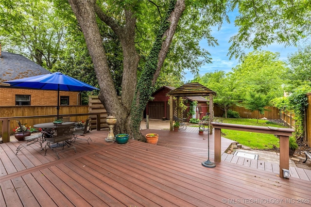 3160 S Owasso Ave, Tulsa, OK 74105 - wooden deck featuring a gazebo, a fenced backyard, and outdoor dining area