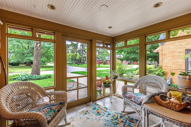 3160 S Owasso Ave, Tulsa, OK 74105 - sunroom featuring concrete floors and recessed lighting