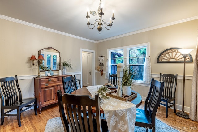 3160 S Owasso Ave, Tulsa, OK 74105 - dining room featuring a chandelier, ornamental molding, light wood-style flooring, and wainscoting
