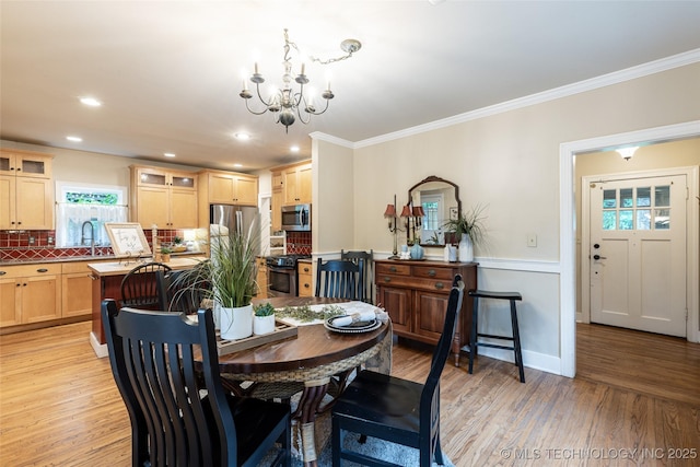 3160 S Owasso Ave, Tulsa, OK 74105 - dining room featuring a chandelier, ornamental molding, light wood-style floors, and recessed lighting