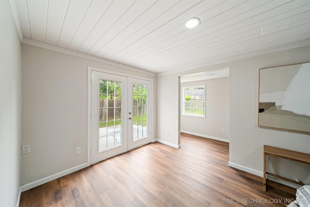 4314 E 4th Pl, Tulsa, OK 74112 - empty room with french doors, ornamental molding, baseboards, and wood finished floors