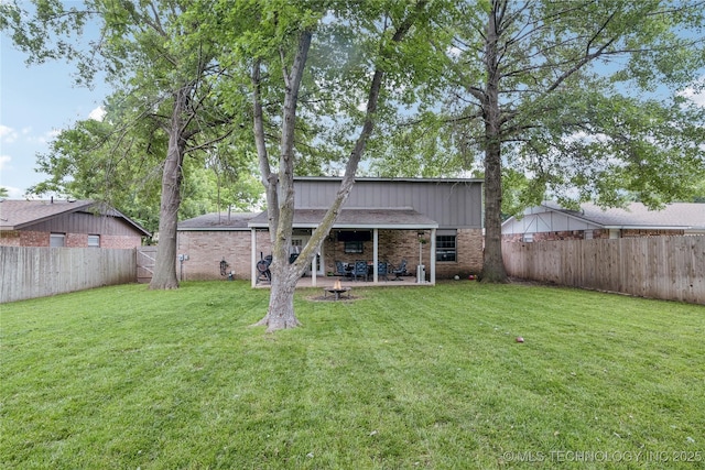 4316 S Ash Ave, Broken Arrow, OK 74011 - rear view of property featuring brick siding and a patio area