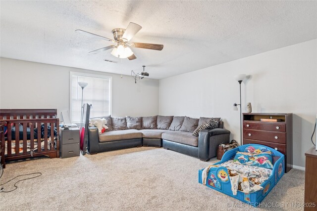 4316 S Ash Ave, Broken Arrow, OK 74011 - living area featuring carpet, ceiling fan, and a textured ceiling