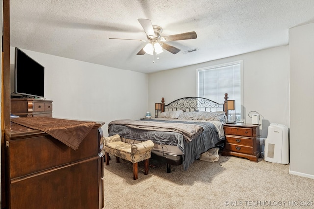 4316 S Ash Ave, Broken Arrow, OK 74011 - carpeted bedroom with a ceiling fan and a textured ceiling