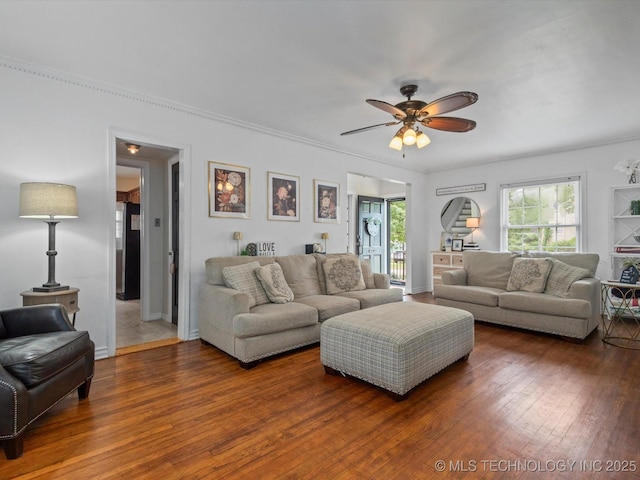 1629 Dewey Ave, Bartlesville, OK 74003 - living area featuring wood finished floors, ceiling fan, crown molding, and baseboards