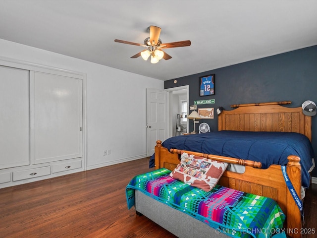 1629 Dewey Ave, Bartlesville, OK 74003 - bedroom featuring wood finished floors, ceiling fan, and baseboards