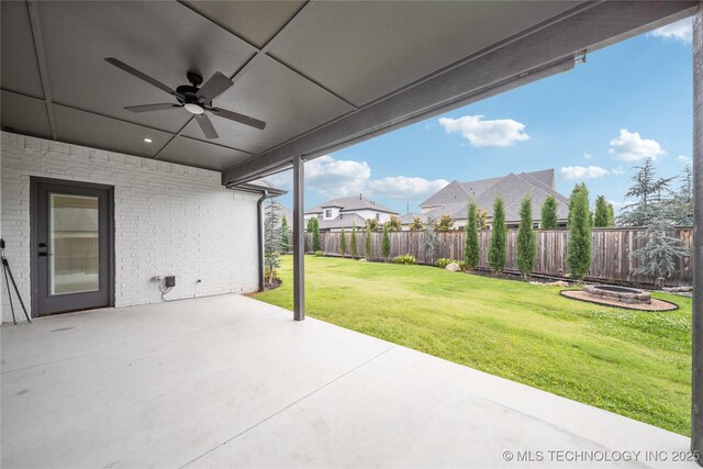 4607 S Retana Pl, Broken Arrow, OK 74011 - view of patio featuring ceiling fan and an outdoor fire pit