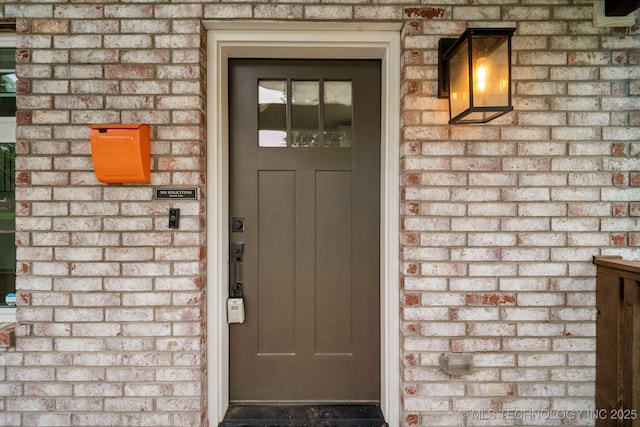 1611 S Lewis Pl, Tulsa, OK 74104 - entrance to property featuring brick siding