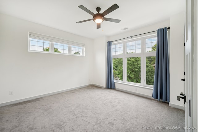 1611 S Lewis Pl, Tulsa, OK 74104 - carpeted empty room featuring ceiling fan and baseboards