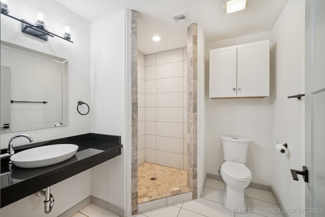 1611 S Lewis Pl, Tulsa, OK 74104 - full bathroom featuring a tile shower and tile patterned flooring