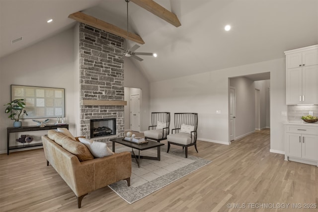 5109 S Everett Dr, Sand Springs, OK 74063 - living area with high vaulted ceiling, baseboards, light wood finished floors, a ceiling fan, and beamed ceiling