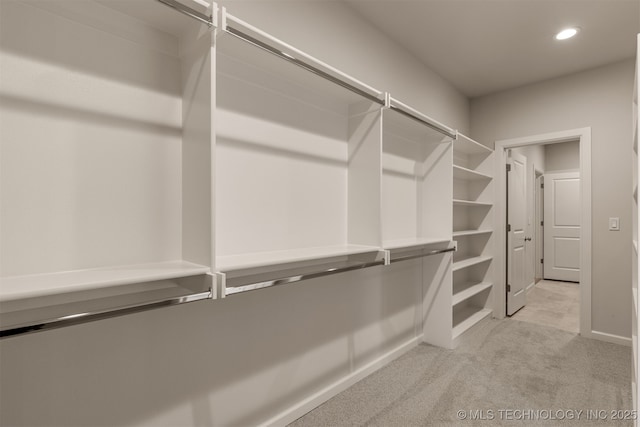 5109 S Everett Dr, Sand Springs, OK 74063 - walk in closet featuring light colored carpet