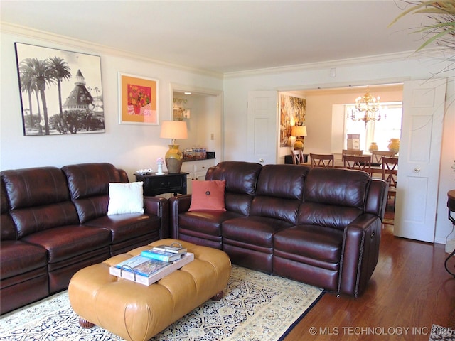 2619 E 47th St, Tulsa, OK 74105 - living area featuring a chandelier, dark wood-style floors, and crown molding