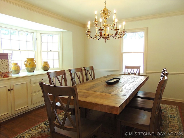 2619 E 47th St, Tulsa, OK 74105 - dining room with crown molding, a chandelier, and dark wood-type flooring