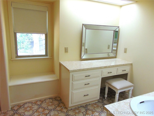 2619 E 47th St, Tulsa, OK 74105 - bathroom with vanity and tile patterned floors