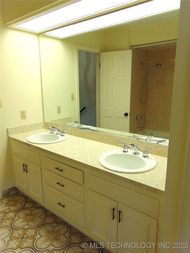 2619 E 47th St, Tulsa, OK 74105 - bathroom featuring double vanity and washtub / shower combination