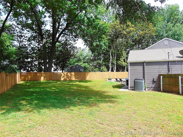 2619 E 47th St, Tulsa, OK 74105 - view of yard featuring central air condition unit